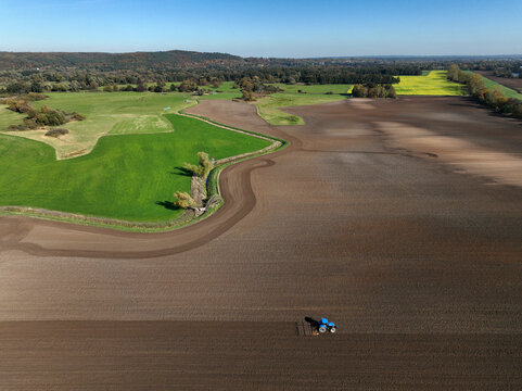 Aerial view of small scale agriculture and ploughing in Brandenburg, Germany.