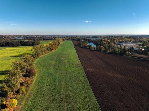 Aerial view of small scale agriculture and ploughing in Brandenburg, Germany.