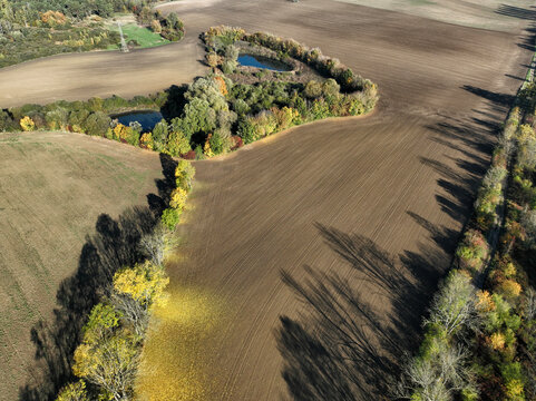 Aerial view of small scale agriculture and ploughing in Brandenburg, Germany.