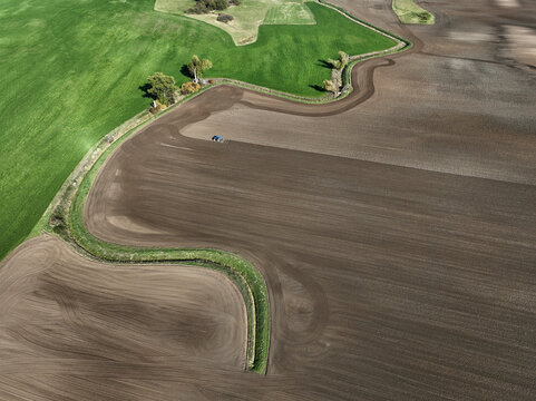 Aerial view of small scale agriculture and ploughing in Brandenburg, Germany.