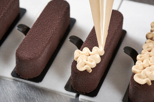 Beautiful confectioner's chocolate cake in the making 