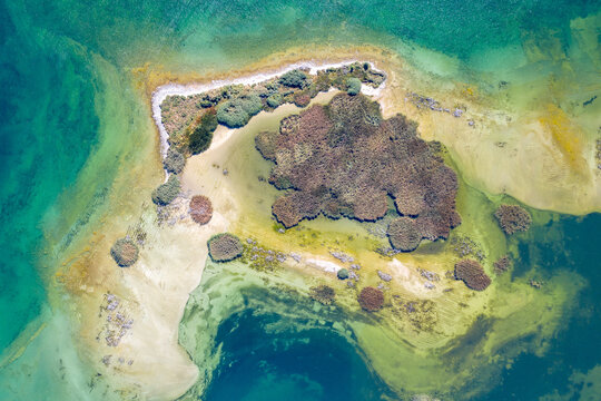 Birds eye view of an island on Sevan lake on sunny summer day. Norashen Reserve, Armenia.