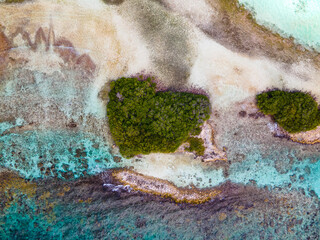 Aerial view of small heart shaped island off the coast of Aruba.