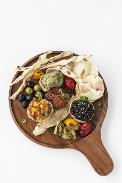 Vegan Tapas Snacks Sharing Platter Board On White Background