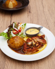 Pork sirloin steak with mash potato and bearnaise sauce