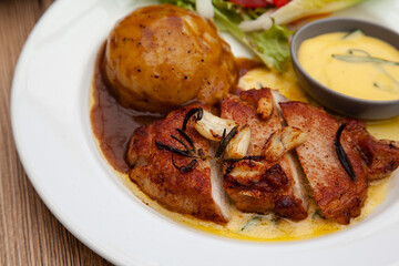 Pork sirloin steak with mash potato and bearnaise sauce