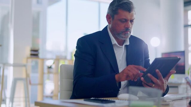 Digital tablet, business and research by senior man CEO in office for planning, browsing and schedule management. Online, internet and search by elderly male manager at a desk for proposal analysis