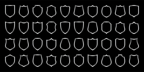 Set of metal vintage shield frames. Shiny silver heraldic shields. Black protection and security symbol, label. Vector illustration