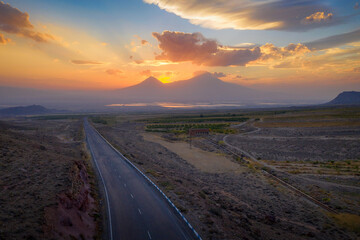 Sunset aerial view of E117 highway and Mount Ararat. Armenia.
