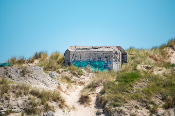 Ruin of a german bunker in Normandy, France from the Second World War, D-Day military invasion by...