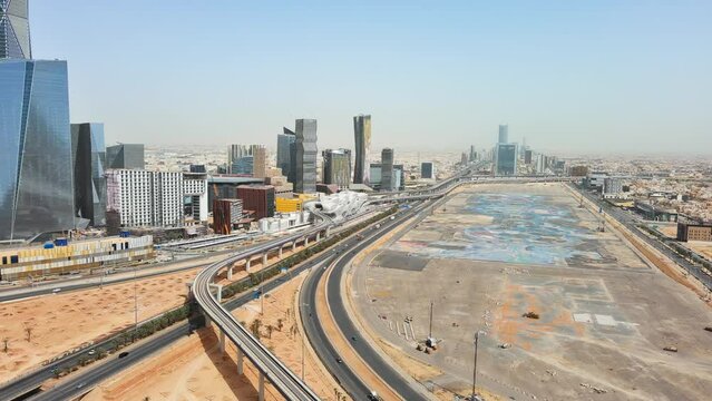 Riyadh: Aerial view of capital city of Saudi Arabia, modern city skyline, skyscrapers of King Abdullah Financial District (KAFD) - landscape panorama of Arabian Peninsula from above
