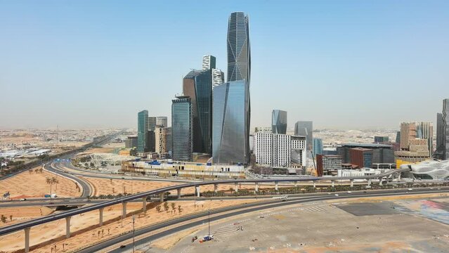 Riyadh: Aerial view of capital city of Saudi Arabia, modern city skyline, skyscrapers of King Abdullah Financial District (KAFD) - landscape panorama of Arabian Peninsula from above

