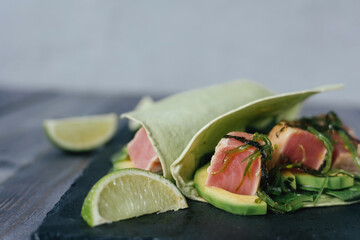 Mexican appetizer poke tacos with fish, mix of cultures, regional cuisine and national, asian, fusion