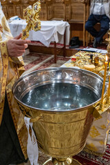 baptismal font with water for the Orthodox baptism in the church