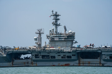 Nuclear War Ship, Military navy ship carrier full loading fighter jet aircraft for prepare troops. forwarder mast. Side view of War Ship.