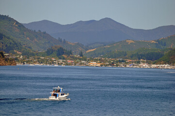 Fototapeta na wymiar boat heading for Picton Harbour