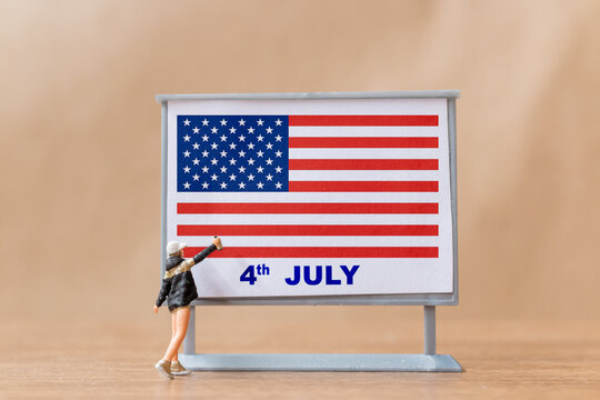 Artist paint on a billboard celebration of the Fourth of July and Independence Day