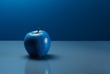apple on blue background