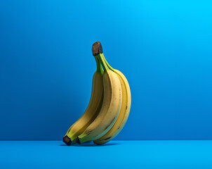bunch of bananas isolated on blue