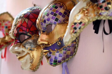 Venetian masks hanging on wall