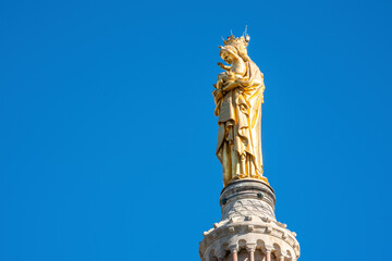 Golden statue on top of Notre Dame de la Garde Marseille, France