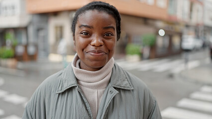 Fototapeta premium African american woman smiling confident standing at street