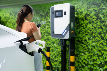 EV charging station for electric car in concept of sustainable energy and eco power produced from...