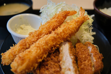 Tonkatsu set with prawn. Panko breaded deep fried pork cutlet served with shredded cabbage.