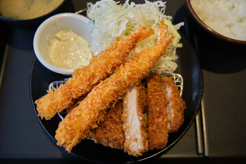 Tonkatsu set with prawn. Panko breaded deep fried pork cutlet served with shredded cabbage.