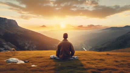 Man sitting in lotus position on top of mountain and looking at sunset. Generative AI.