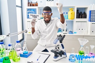 African american man working on cruelty free laboratory annoyed and frustrated shouting with anger, yelling crazy with anger and hand raised