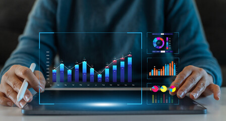 People use tablet with business analyzing and data management system and make report with KPI, strategy, finance, sales, marketing, money, business growth, financial investment graph