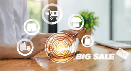 Business people use computer laptop for ordering online shopping on a shopping cart virtual screens. And online payment option or digital wallet online transaction and e-commerce technology concept