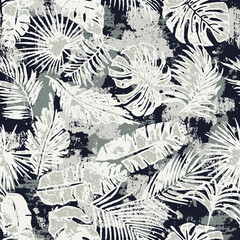 Tropical monstera and palm leaves wallpaper grunge abstract vector seamless pattern  © PrintingSociety