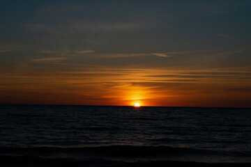 Fototapeta na wymiar Sunset over the sea at Lithuania 