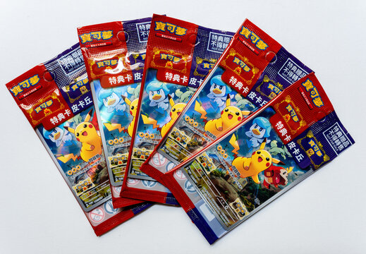 Hamburg, Germany - 02052023: photo of five sealed Chinese Pikachu pokemon promo trading card from the Scarlet and violet set.