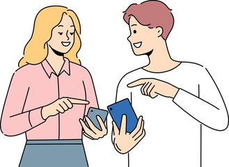 Fototapeta premium Smiling couple browse internet on cellphones