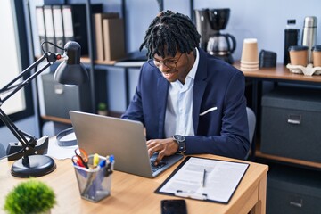 Fototapeta na wymiar African american man business worker using laptop working at office