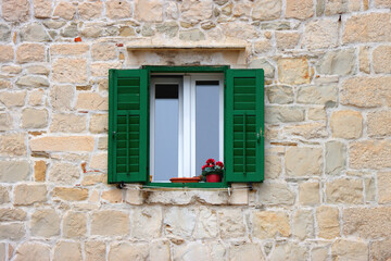 Picturesque windows on traditional old Mediterranean house in Split, Croatia.