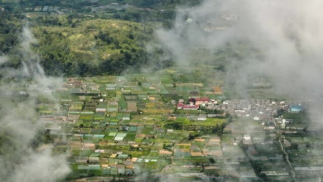 Farmland and farm fields in the countryside of Sumatra. Berastagi, Indonesia.