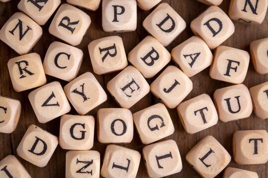 Random sorted wooden alphabet letters