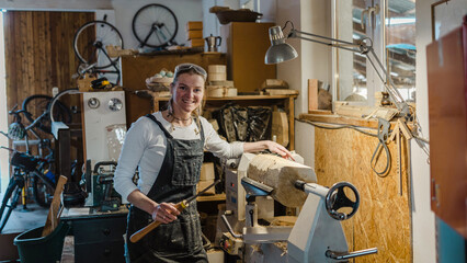Portrait of confident craftswoman in her workshop
