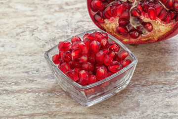 Ripe red Pomegranate seeds in the bowl