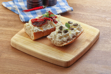 bruschetta with soft cheese capers and tomato