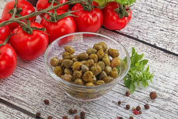 Marinated green capers in the bowl