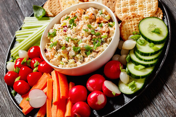 salmon salad with fresh veggies and crackers