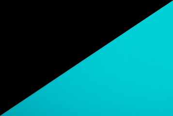 The Different Black and turquoise paper background with empty space for text