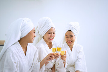 Pretty women spend time at resort and spa hotel.