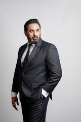 Indian corporate or businessman giving expression on white background.