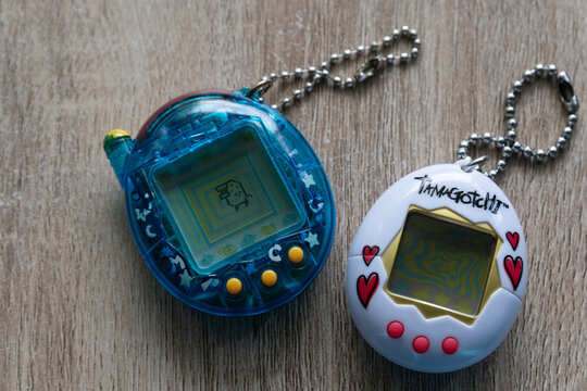 Two Tamagotchi Virtual Pets on the table